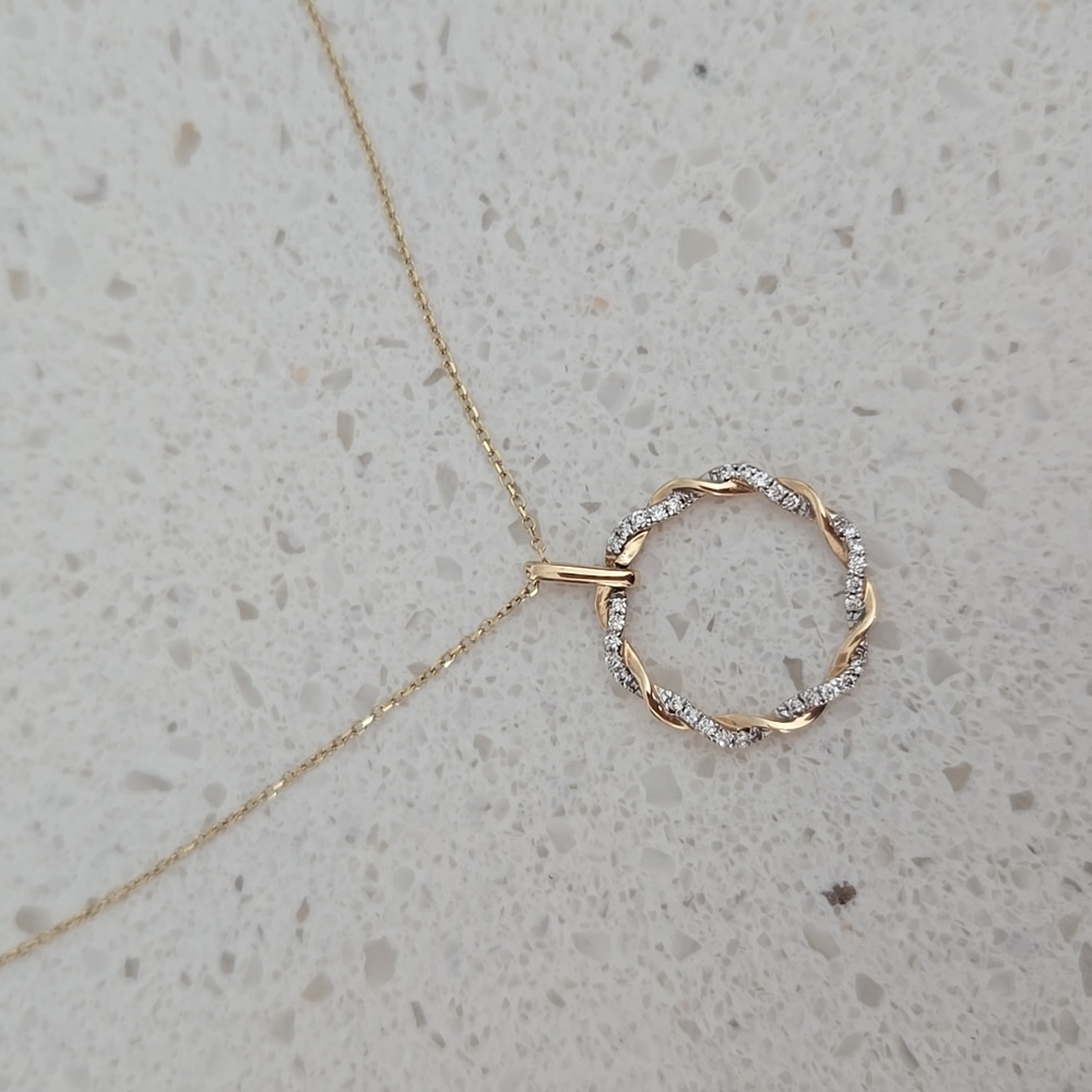 Gold and diamond circle necklace